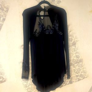 PERFECT FOR THE HOLIDAYS. See through on the top with embroidery.